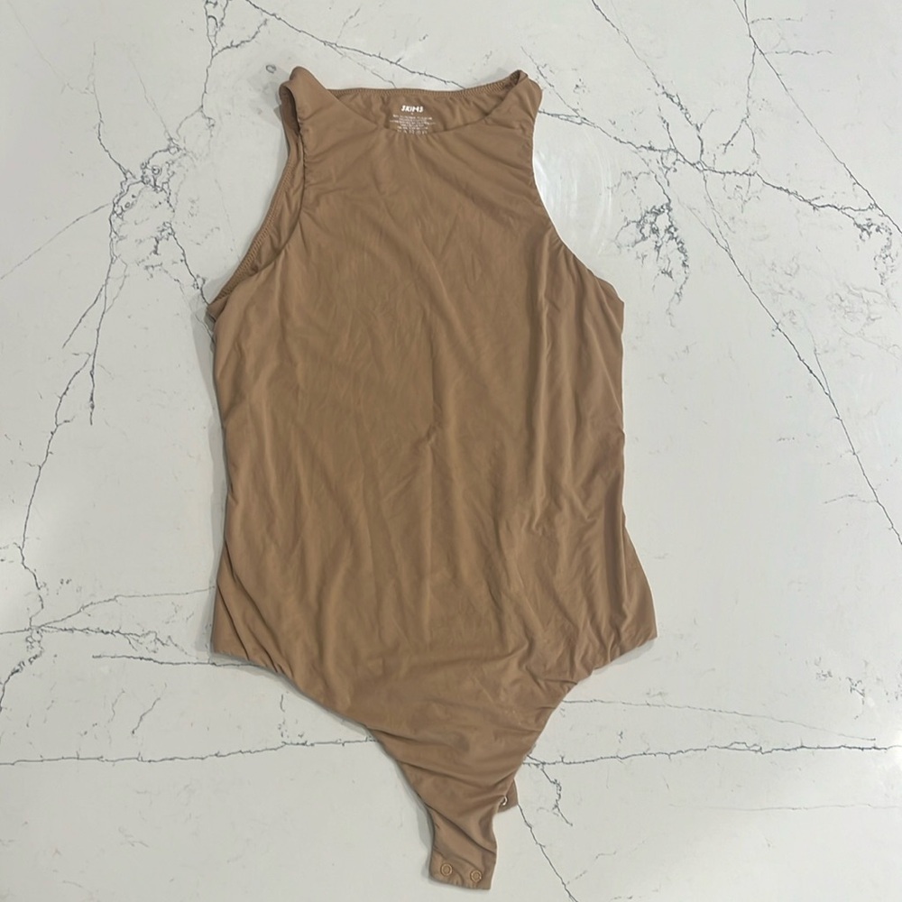 SKINS bodysuit